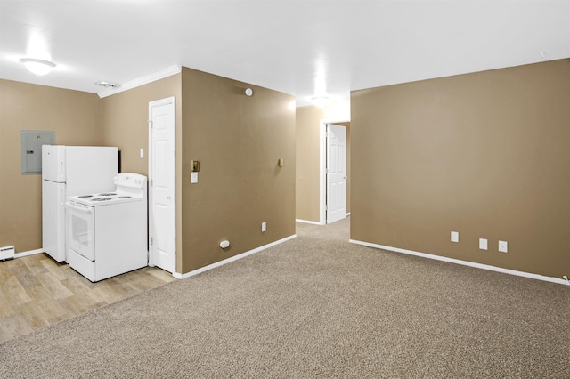 interior space featuring a baseboard heating unit, electric panel, and light hardwood / wood-style flooring