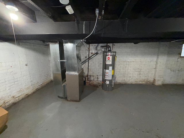 basement with heating unit and water heater