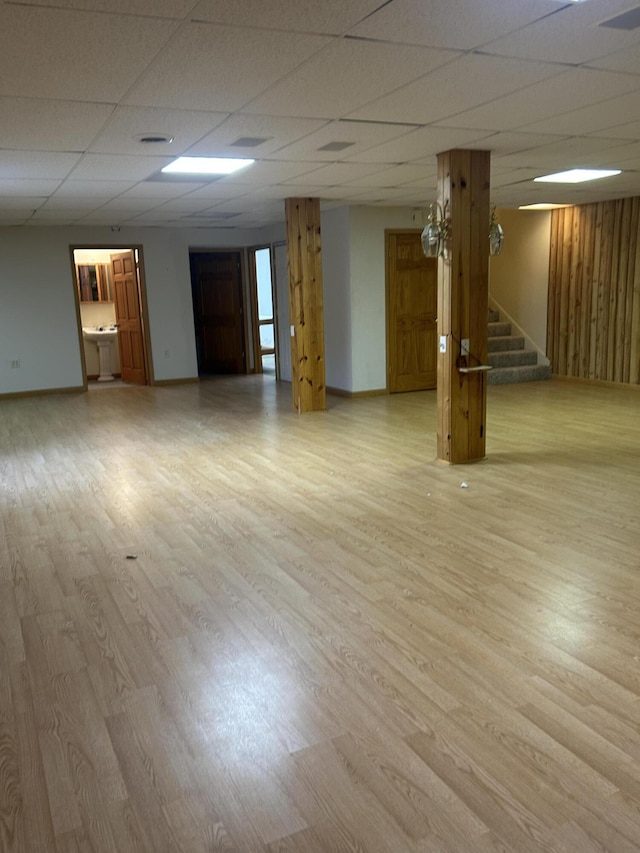 832 E Park Dr, Niles, MI 49120 - finished basement with light wood-type flooring, stairway, and a drop ceiling