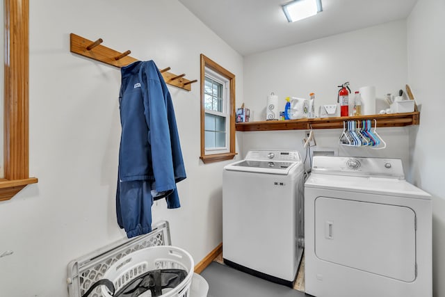 laundry area with separate washer and dryer