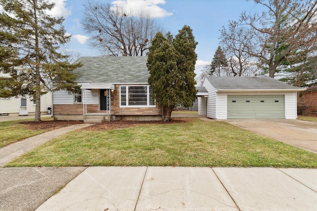 view of front facade featuring a front lawn and a garage