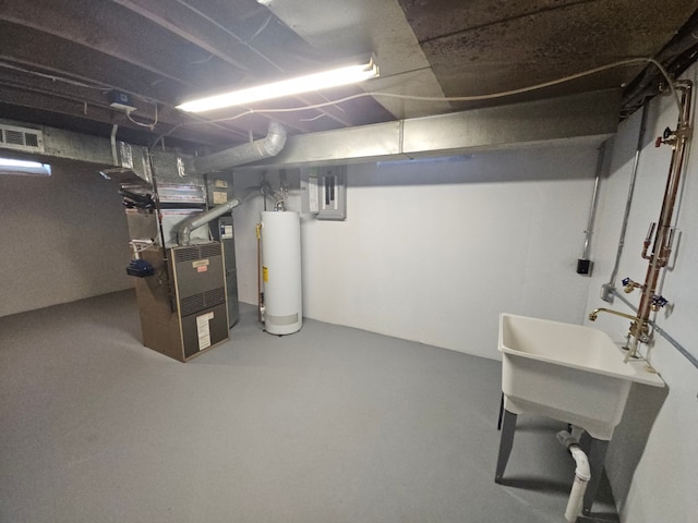 basement featuring heating unit and water heater