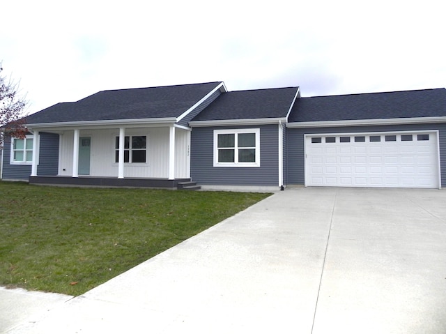 1382 Flanders St, Sturgis, MI 49091 - ranch-style home with concrete driveway, a front lawn, a garage, and covered porch