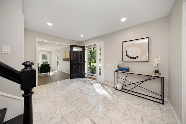 foyer with hardwood / wood-style floors