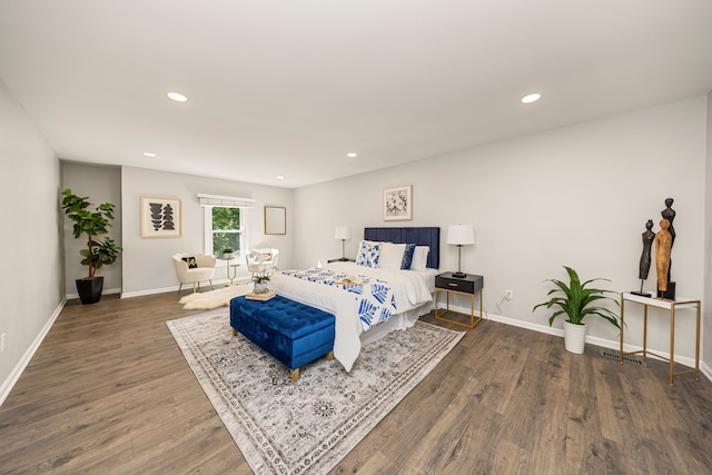 bedroom featuring dark wood-type flooring