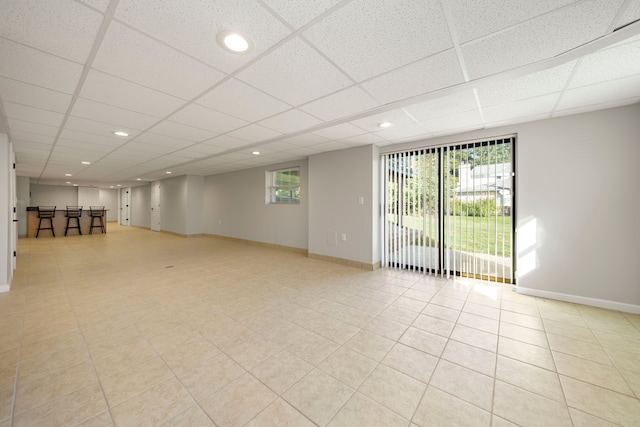 interior space featuring a drop ceiling