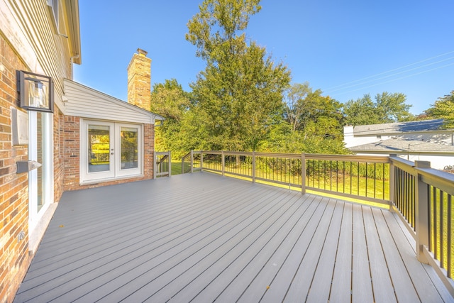 wooden terrace featuring french doors