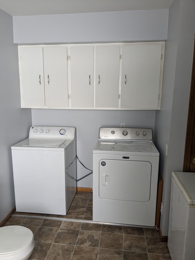 clothes washing area featuring washing machine and clothes dryer