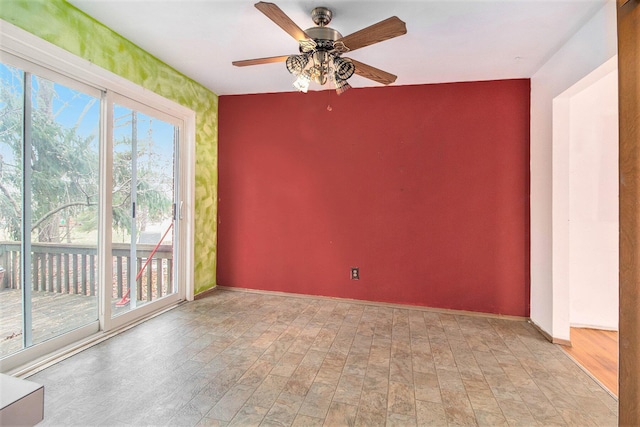 spare room with ceiling fan and light hardwood / wood-style flooring