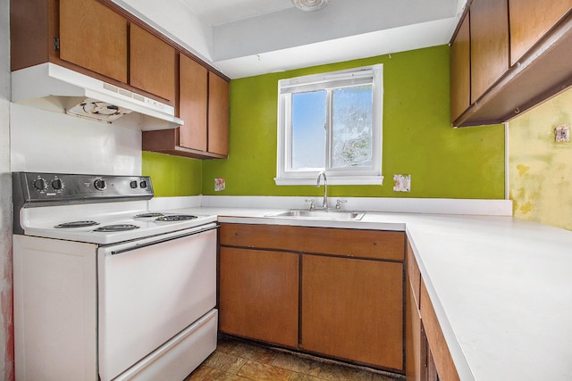 kitchen with sink and electric stove