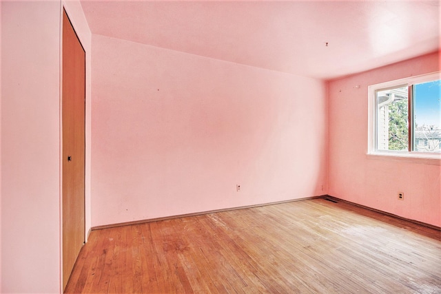 unfurnished room featuring light hardwood / wood-style flooring