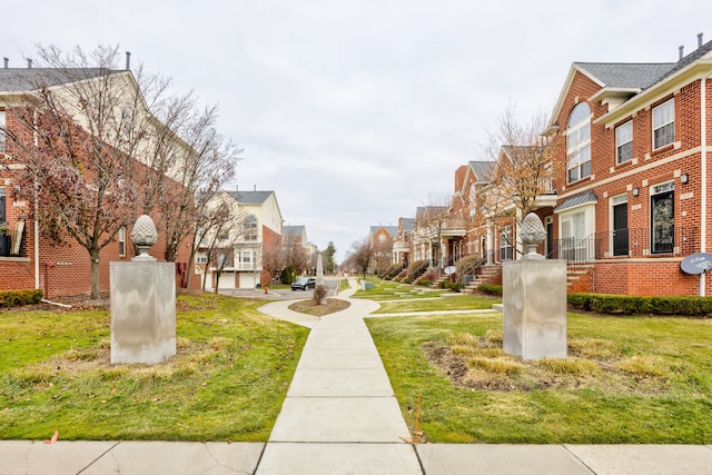 view of community featuring a lawn