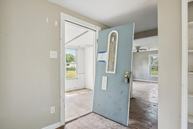 foyer with ceiling fan