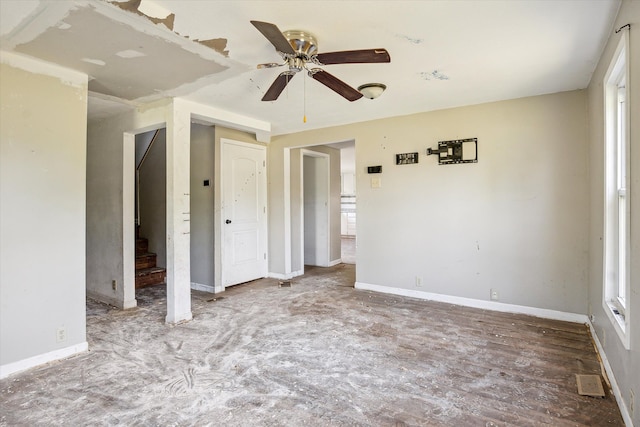 unfurnished bedroom with ceiling fan and wood-type flooring