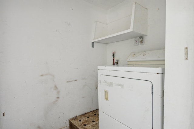 laundry room featuring washer / dryer