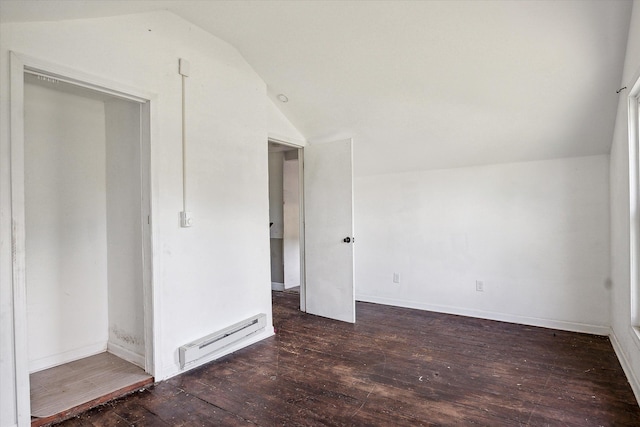 bonus room featuring lofted ceiling, dark wood-type flooring, and a baseboard heating unit