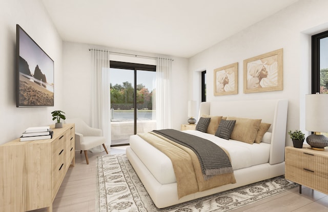 bedroom featuring access to exterior and light hardwood / wood-style floors