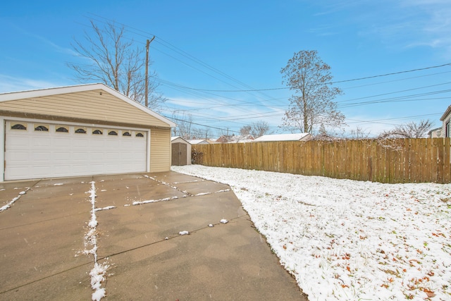 exterior space featuring a shed and a garage