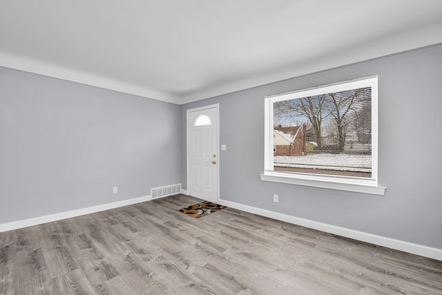 foyer with light hardwood / wood-style flooring