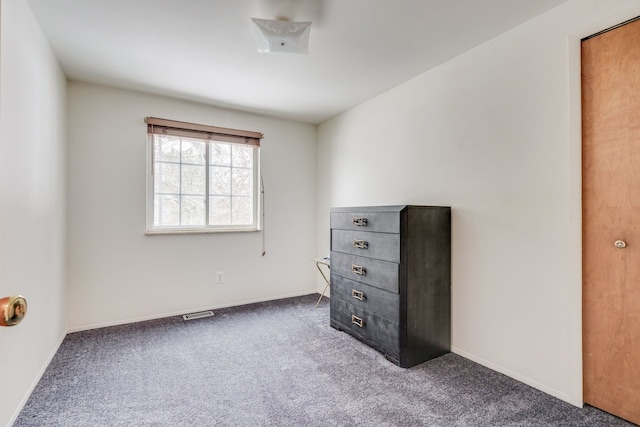 bedroom featuring carpet