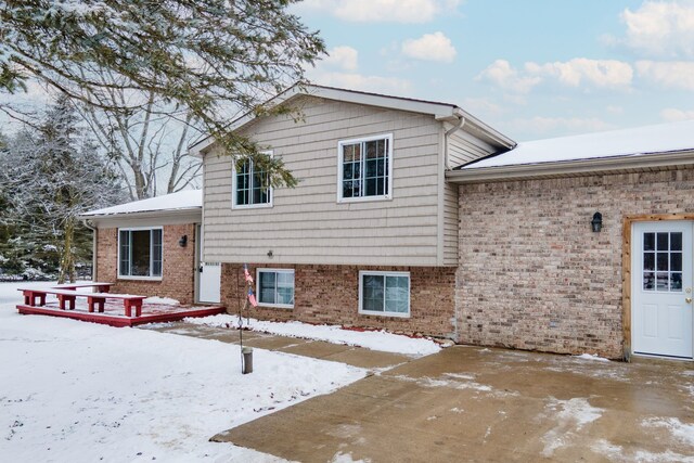 view of snow covered house