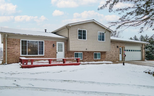 split level home featuring a garage