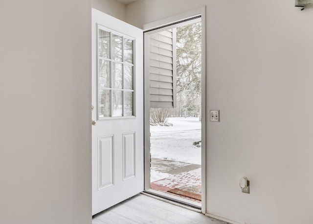 doorway to outside with light hardwood / wood-style flooring