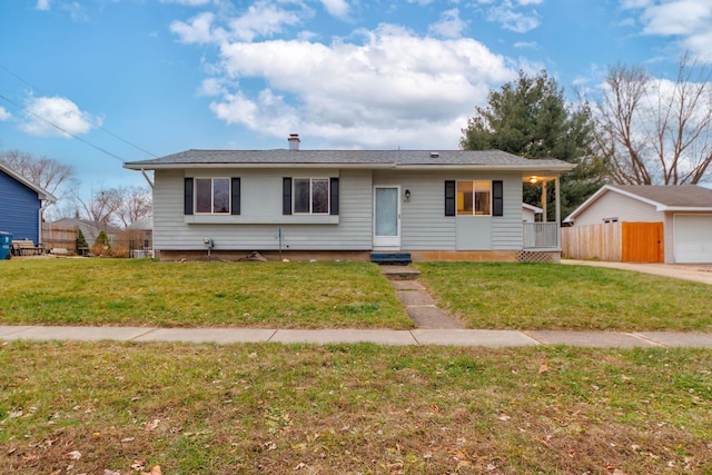 single story home with a front lawn