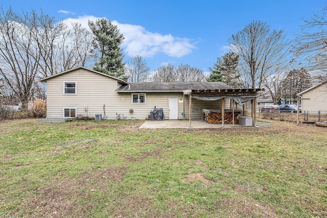 back of house with a patio, a lawn, fence, and central air condition unit