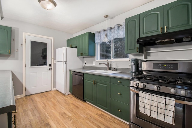 kitchen with under cabinet range hood, stainless steel range with gas cooktop, green cabinetry, and dishwasher