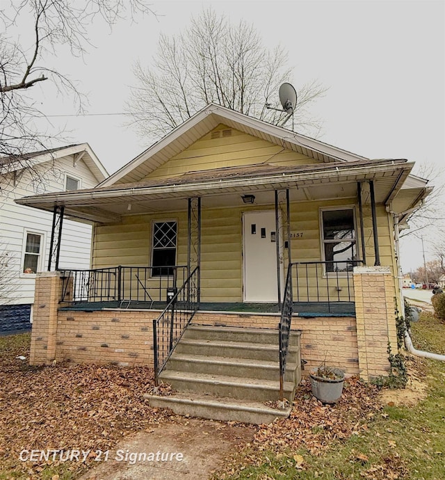 bungalow-style home featuring covered porch