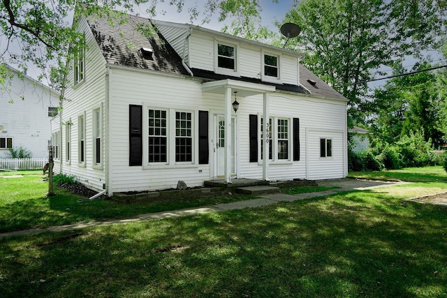 view of front of home with a front yard