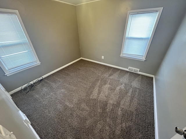 spare room with carpet flooring