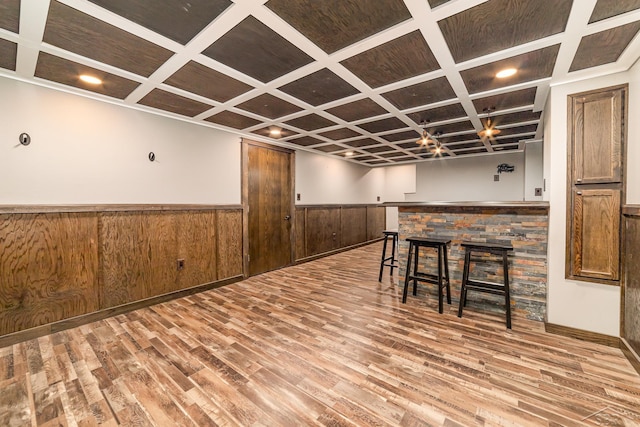 basement featuring hardwood / wood-style floors