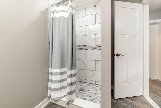 bathroom with a shower with curtain