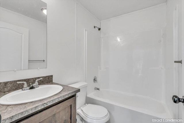 full bathroom featuring vanity, shower / bath combination, and toilet