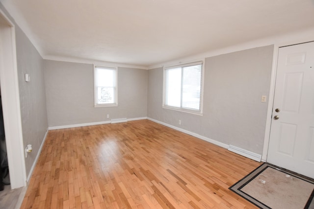 entryway with plenty of natural light and light wood-type flooring