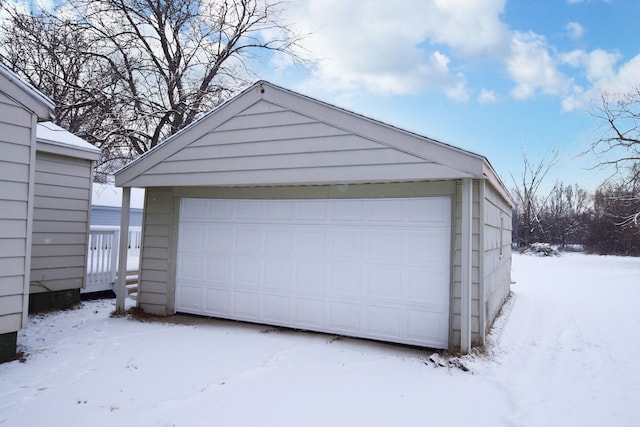 view of snow covered garage