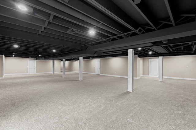 basement with carpet flooring