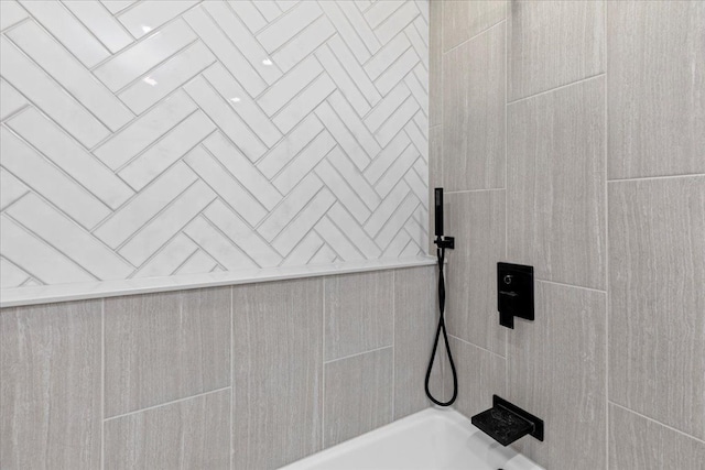 interior details with tiled shower / bath