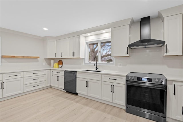 kitchen with dishwasher, stainless steel range with electric cooktop, white cabinets, wall chimney range hood, and light hardwood / wood-style flooring