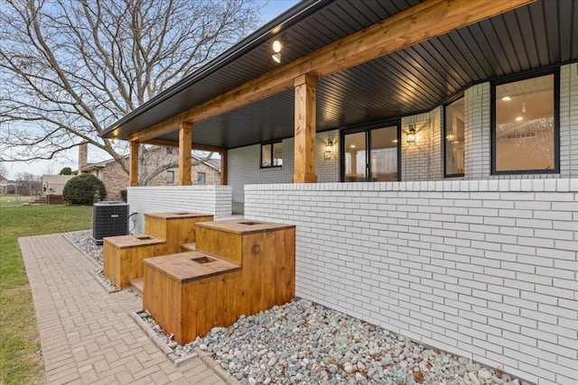 view of patio / terrace featuring central air condition unit