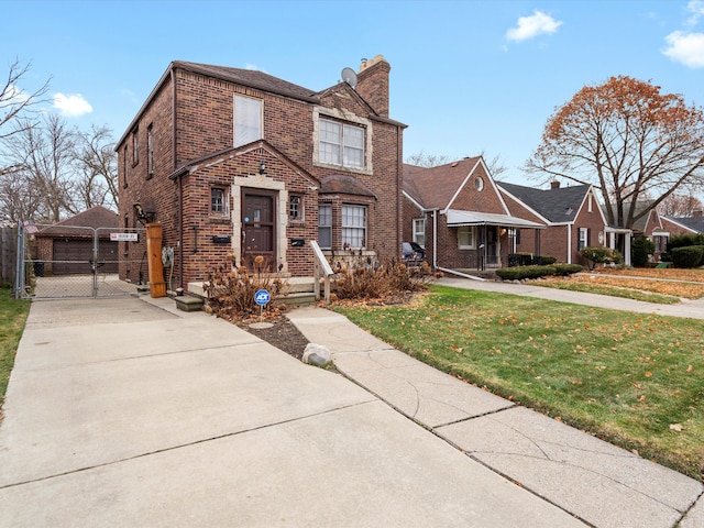 view of front facade featuring a front yard and a garage