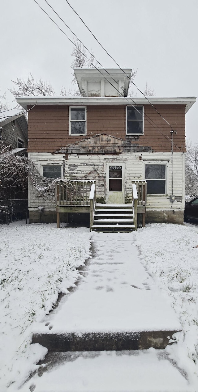 view of snow covered property