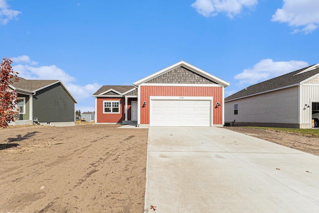 ranch-style home featuring a garage