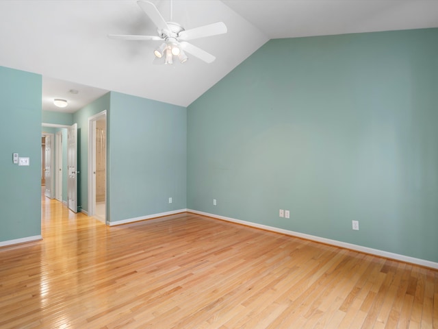 unfurnished room featuring ceiling fan, light hardwood / wood-style flooring, and lofted ceiling