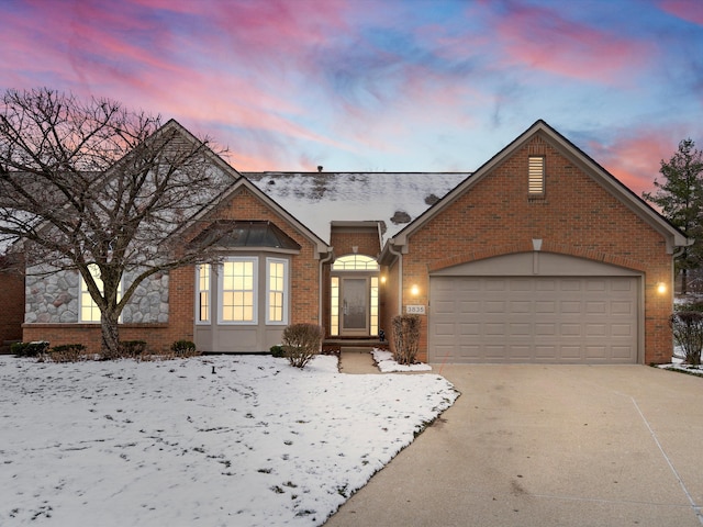 view of front of home with a garage