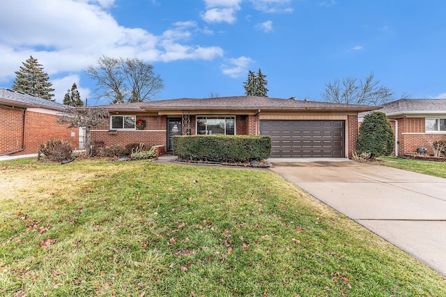 single story home featuring a front yard and a garage