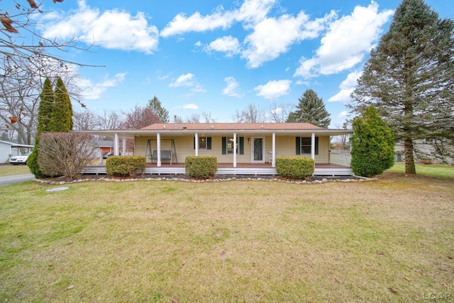 ranch-style home with a porch and a front yard