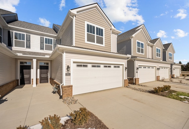 view of front of home with a garage